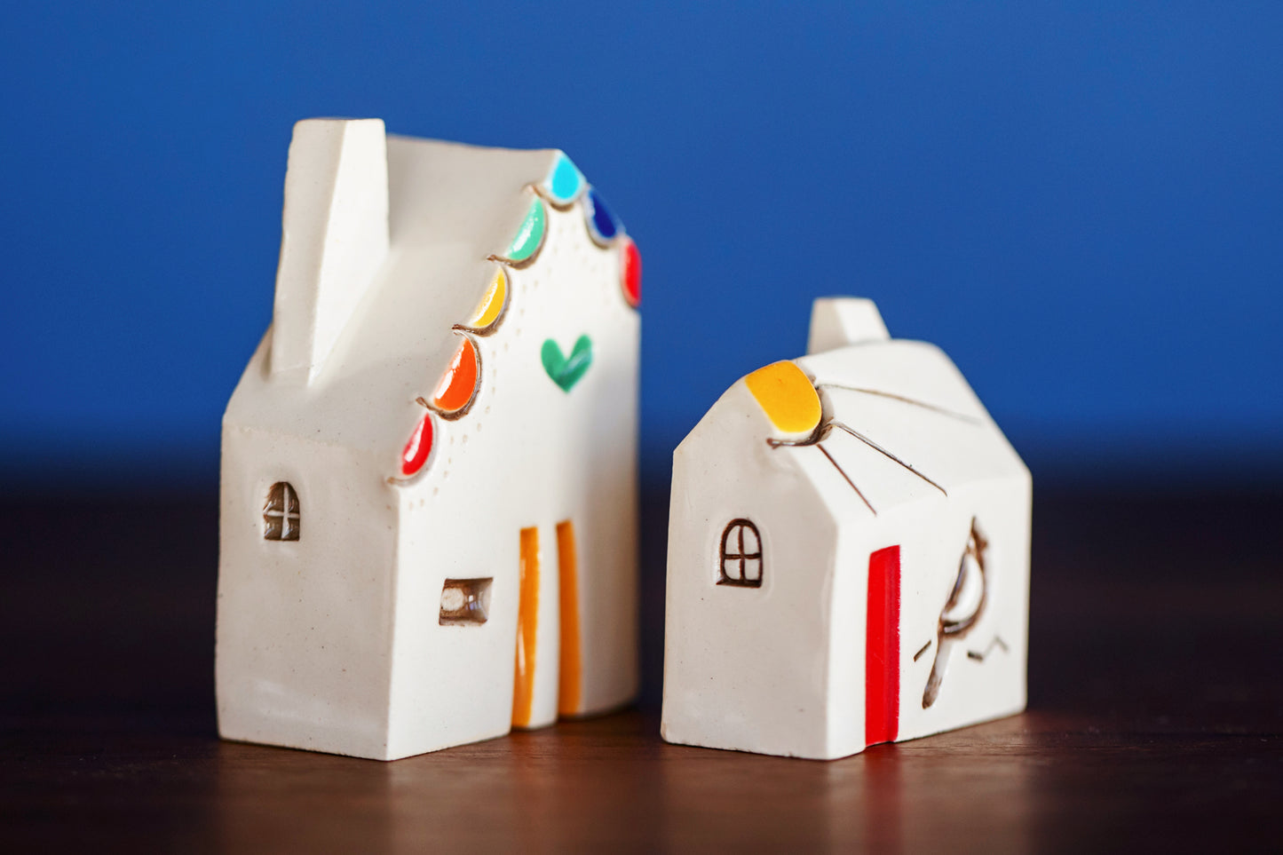 Rainbow Village with Green Heart and Cardinal Bird