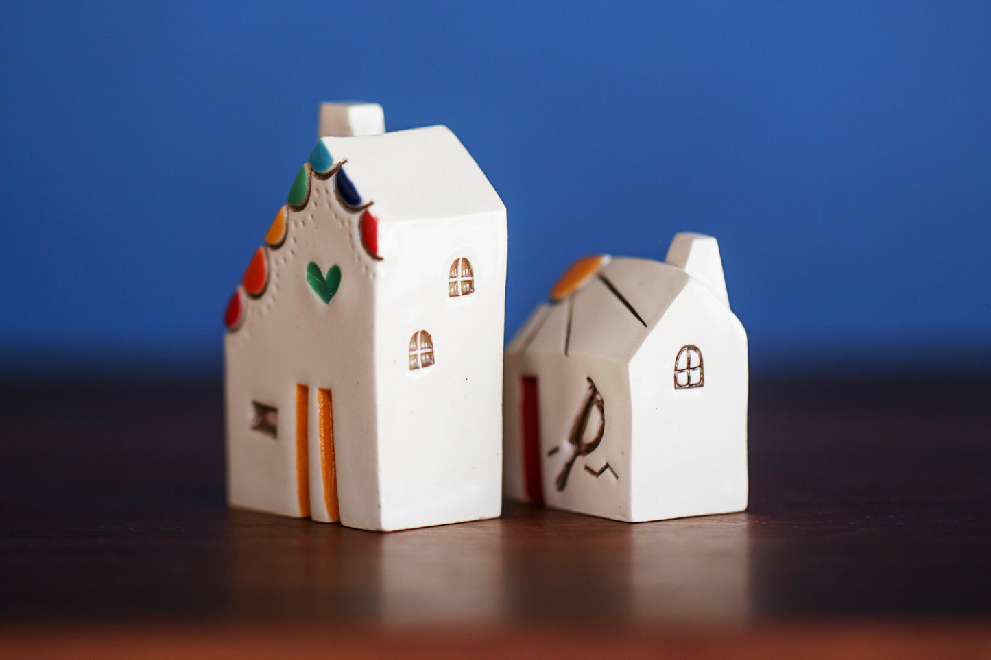 Rainbow Village with Green Heart and Cardinal Bird