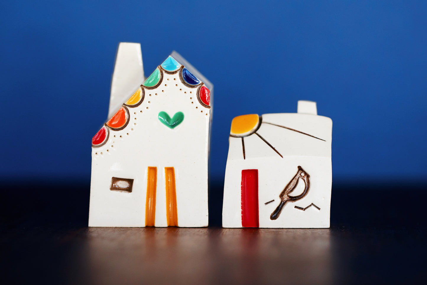 Rainbow Village with Green Heart and Cardinal Bird