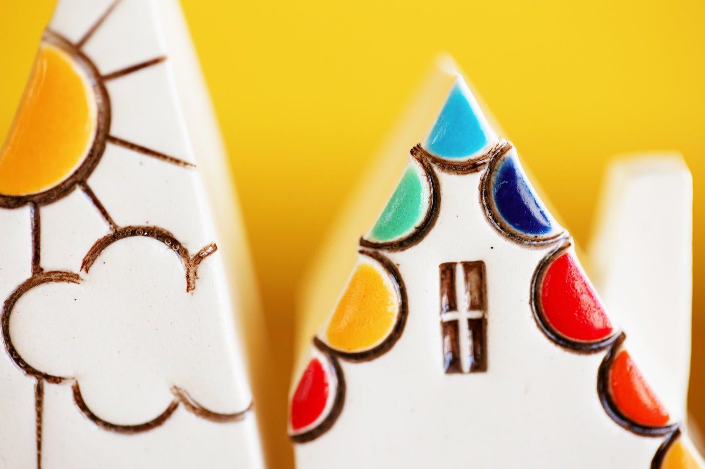 Rainbow Ceramic Village with Sunshine and Orange Doors