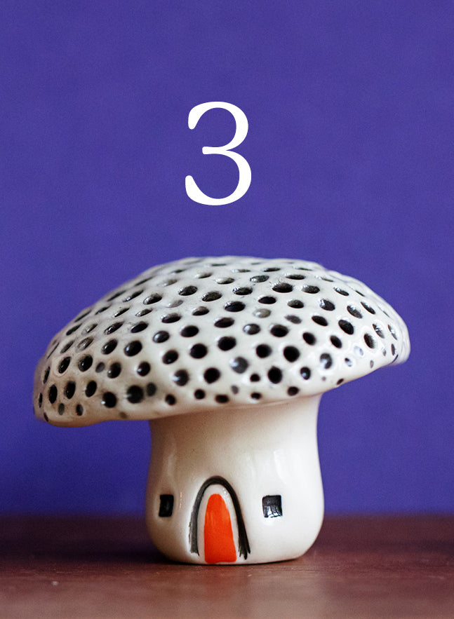 Ceramic Mushroom Houses with Rainbow Dots and Cat