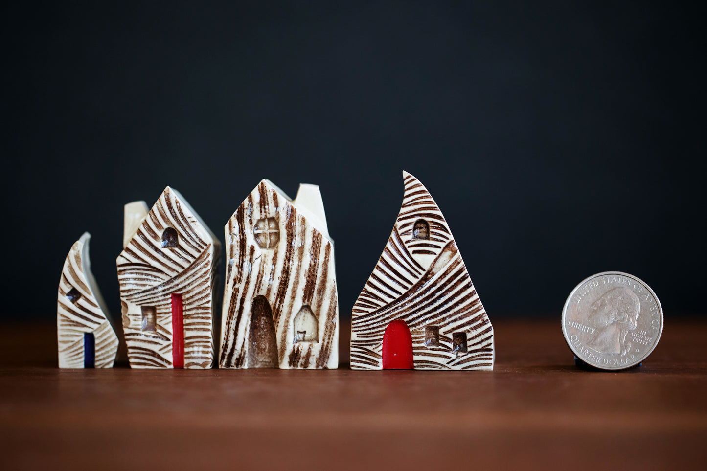 Textured Ceramic Houses with Red Doors and a Cat in Window
