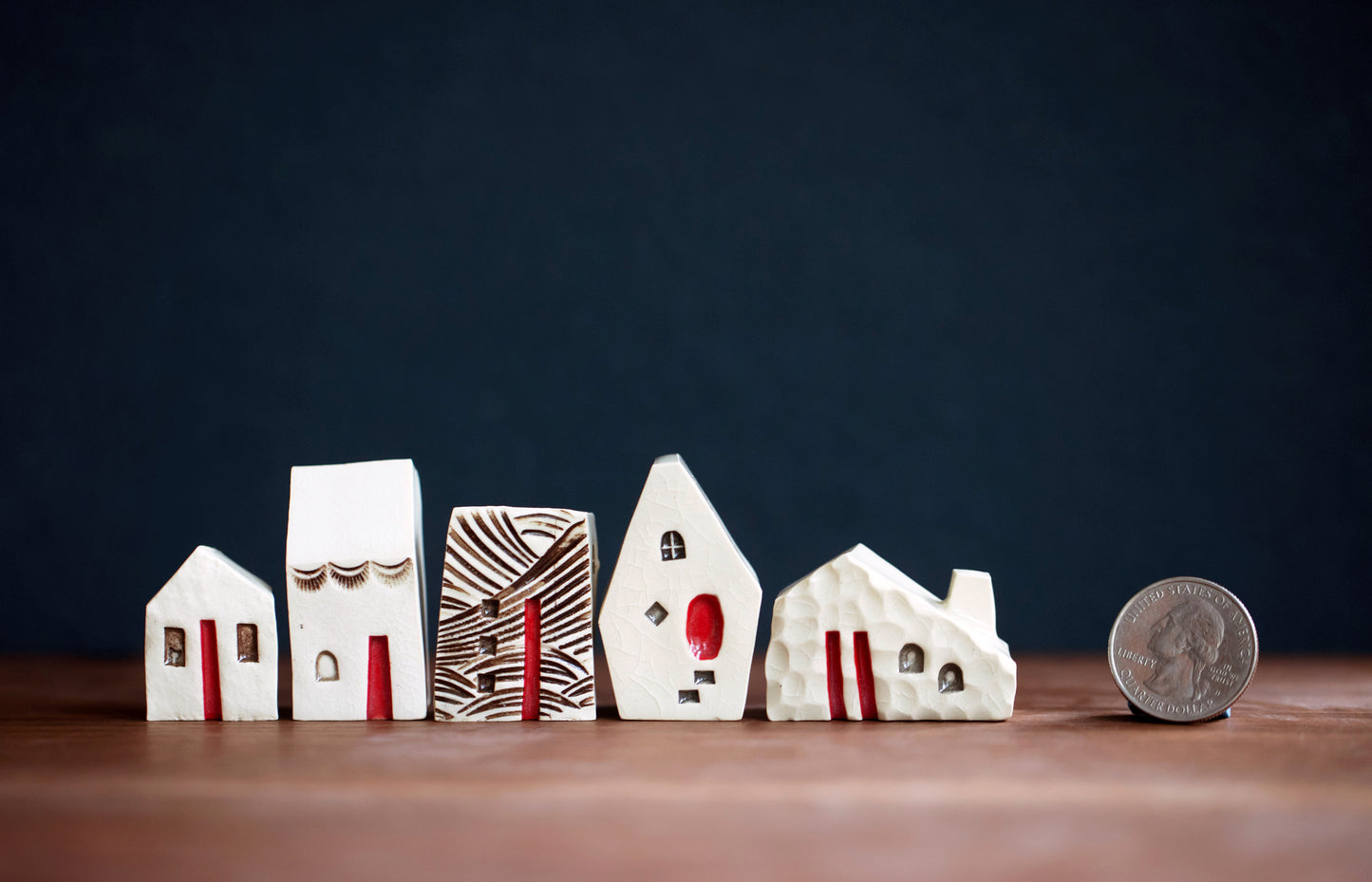 Artsy Ceramic Village with Red Doors and Cat in Window