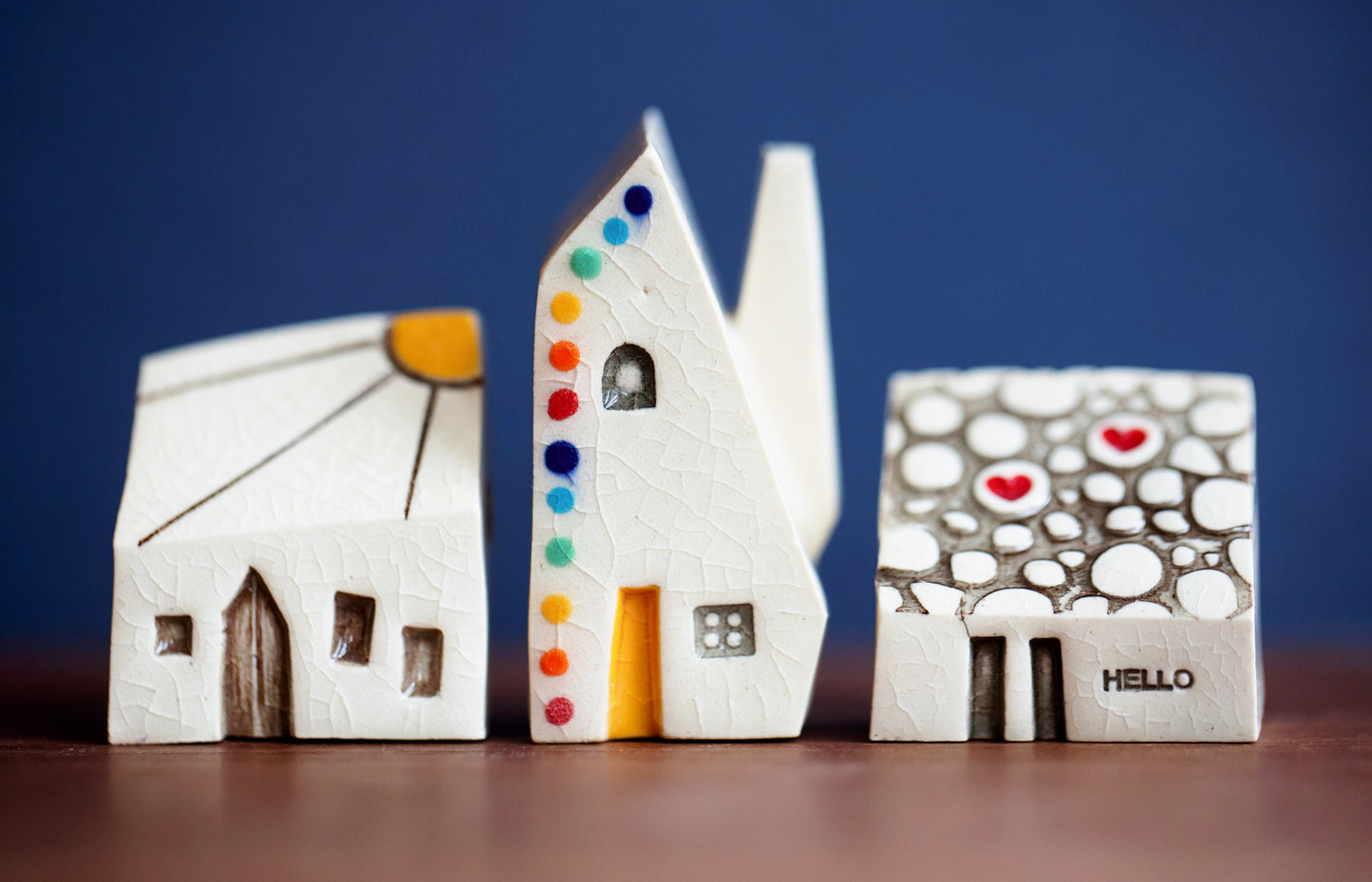 Small Set of Three Ceramic Houses with Sunshine, Hearts and Rainbow