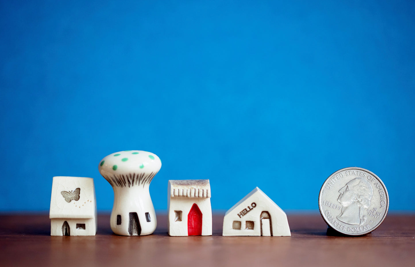 Tiny Village of Ceramic Houses and A Mushroom with Green Dots