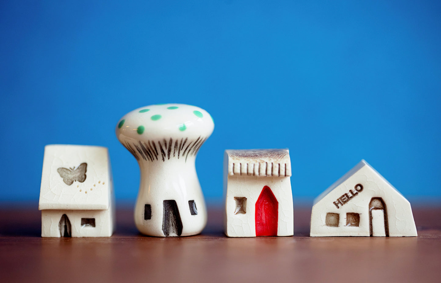 Tiny Village of Ceramic Houses and A Mushroom with Green Dots