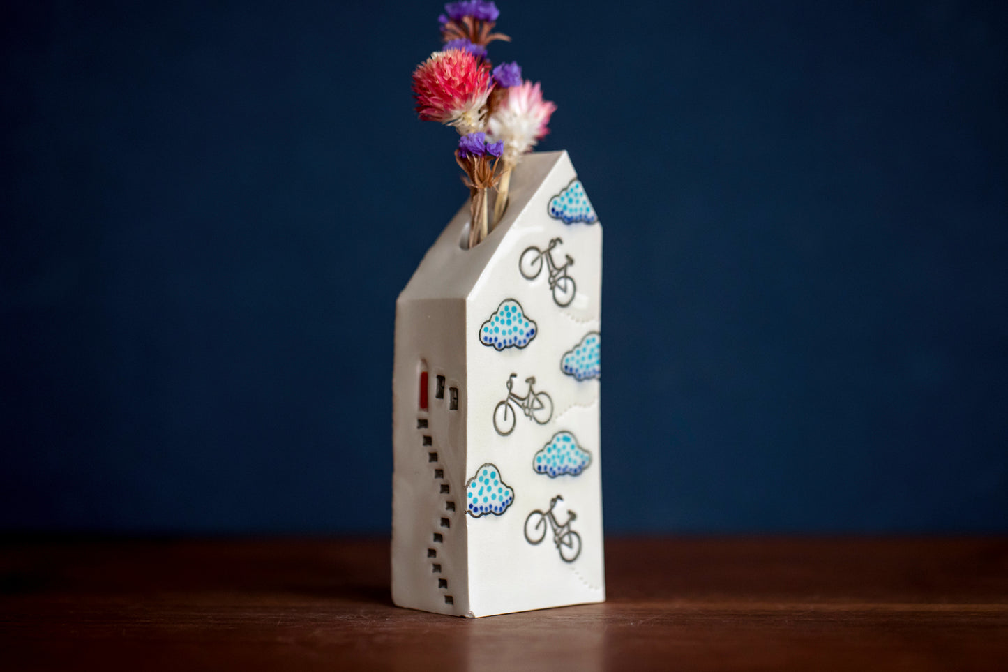 Bud Vase House with Bicycles and Clouds
